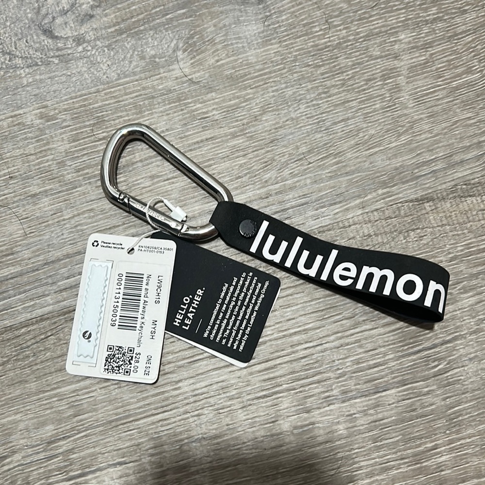 Lululemon now and always keychain
